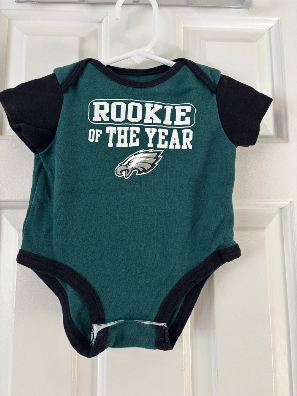 NFL Team Apparel Infant Onesie in Teal with Black Trim